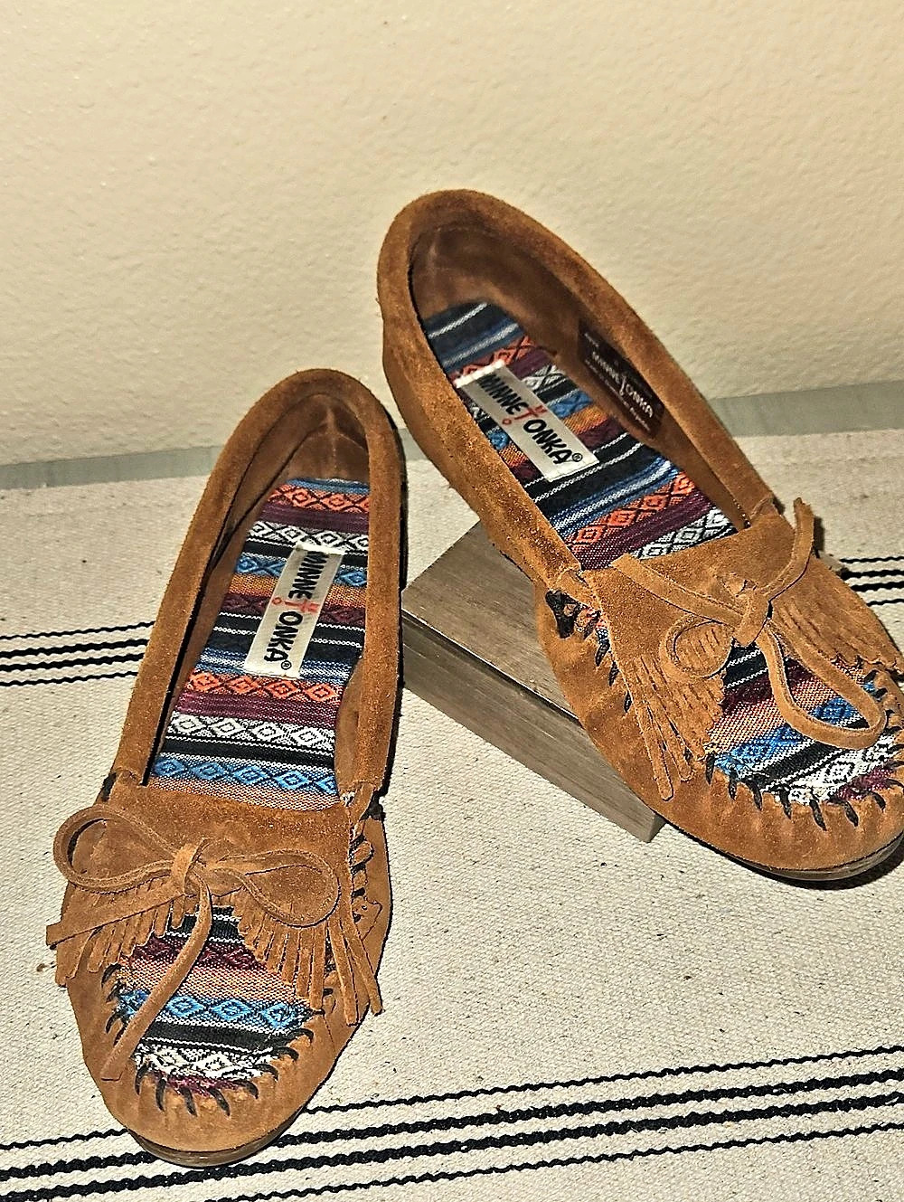Minnetonka Embroidered Fringe Moccasin Flats in Brown